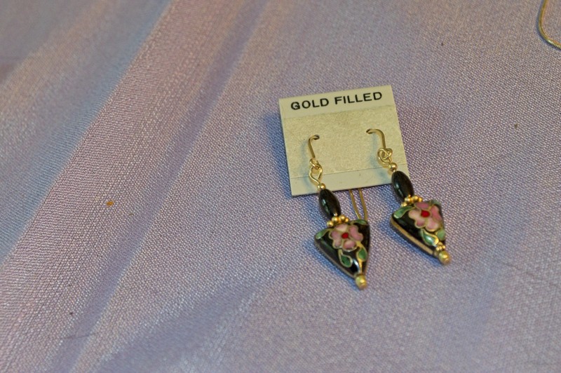 triangular cloisonne beads with a black background feature in these gold-filled earrings