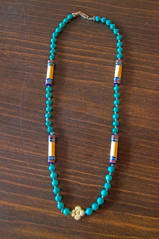 image of long turquoise, bone, and cloisonne necklace strung on silk and hand knotted